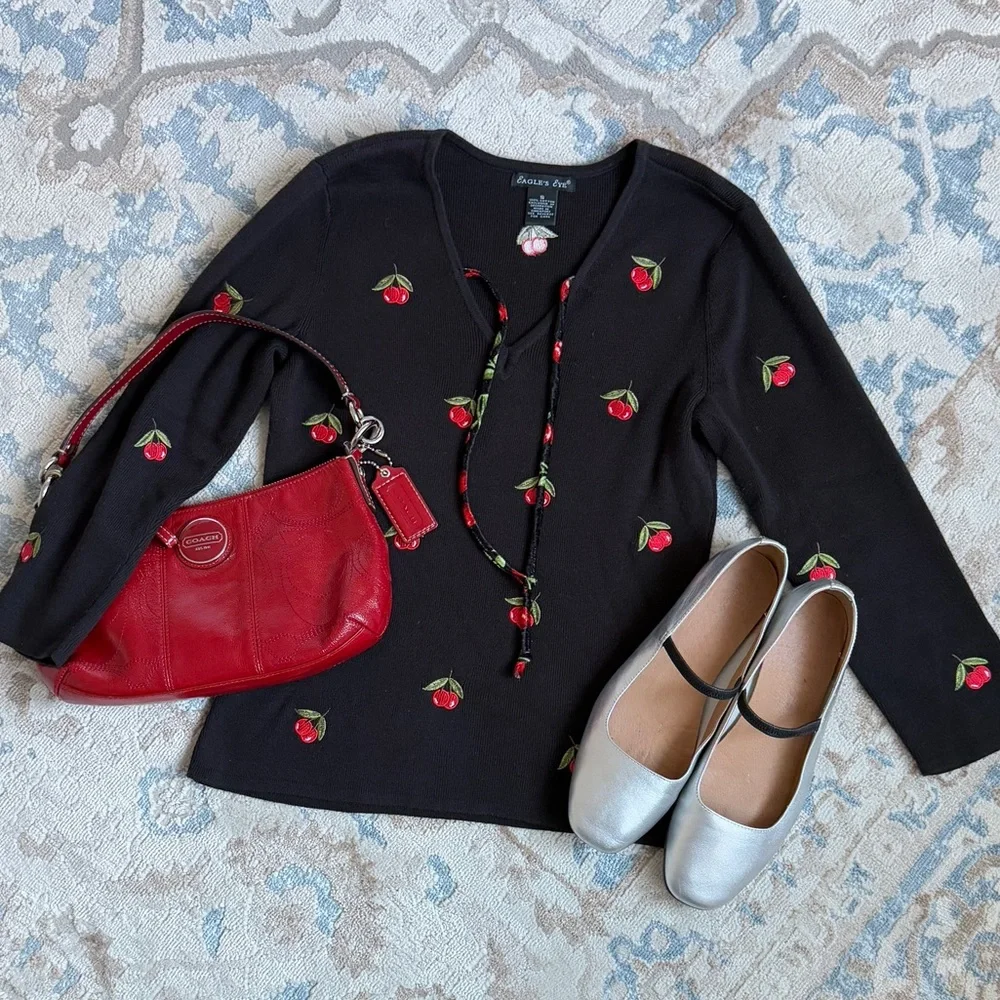 Black long sleeve Y2K vibes top with red cherries and a tie front detail size S